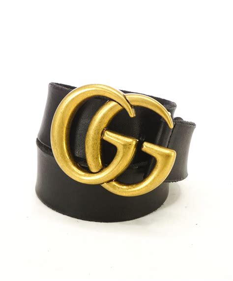 gucci belt con una g|gucci belt with gold buckle.